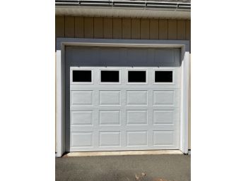 A Garage Door With Electric Opener-door #1