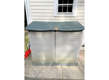 A Rubbermaid Plastic Trash Shed-front House