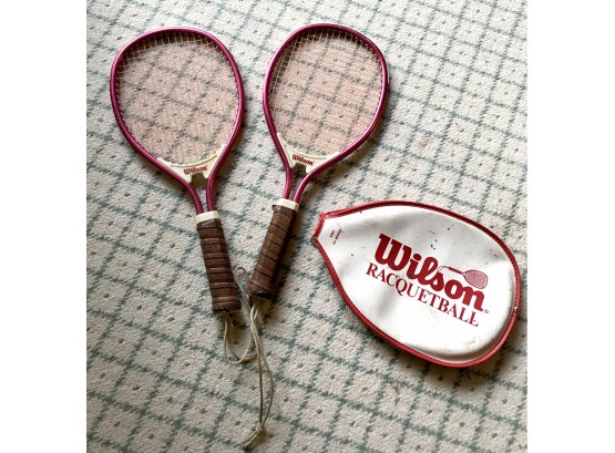 Two Wilson Racquet Ball Rackets Along With Covers
