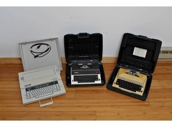Group Of Vintage Typewriters With Cases