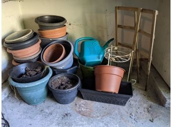 Grouping Of Plastic Pots In Various Sizes And Colors Plus Watering Can, Caddy And Stand
