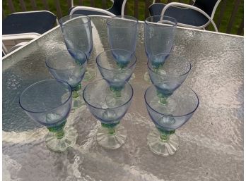 A Set Of 9 Blue And Green Glasses