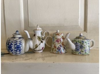 4 Small Teapots