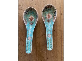 2 Matching Resting Asian Spoons Marked Made In China With Lettering