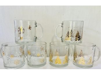 2 Sets Of Glass Holiday Celebration Mugs Set Of 3 With Snow Flakes And One Set 0f 4 With Trees And Snow
