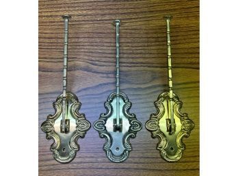 Three Brass Tone Clothing Hooks