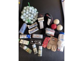 Laser Link Golf Rangefinder And A Bunch Of Golf Balls And Tees