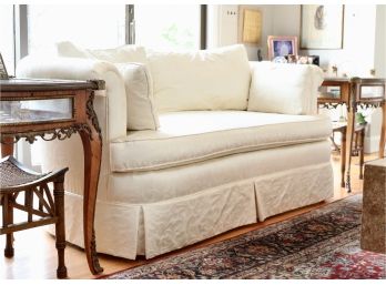 Custom Sateen Damask Upholstered Pillow Curved Rolled Back Loveseat With Rolled Arms And A Pleated Skirt