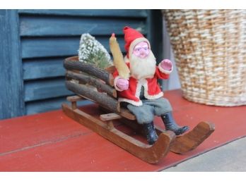 German Santa In Natural Wood Sled