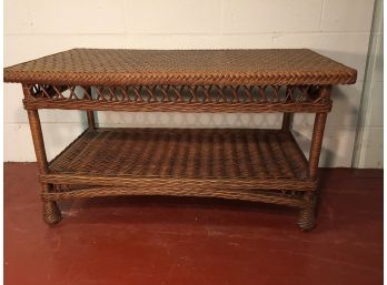 Woven Cane Two Tier Cocktail Table With Tempered Glass Top. (Click On Photograph For Full Description And Additional Photos)