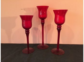 Three Tall Red Glass Candle Holder Stems. (Click On Photograph For Full Description And Additional Photos)