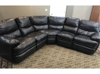 Like New Leather Sectional With End Reclining Rockers