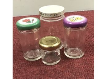 Four Small Jars With Lid
