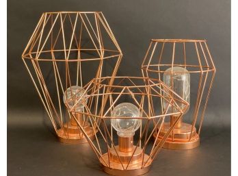 A Great Grouping Of Copper Cage Lights