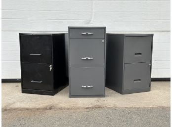 Three Metal File Cabinets