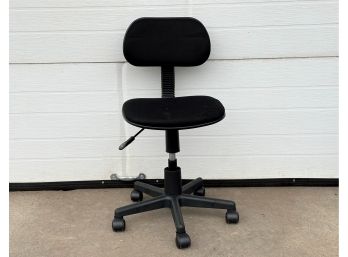 A Simple Office Chair With A Wheeled Base