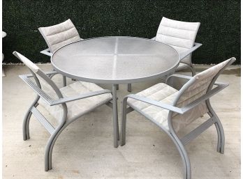 Four Outdoor Chairs And Table