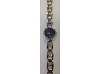 Ladies Silver Tone Guess Watch W/Blue Face And Bracelet Band