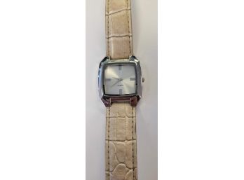 Ladies Rectangular Silver Tone Watch W/Cream Colored Band