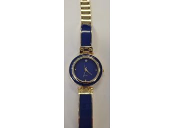 Ladies Gold Tone And Navy Blue Cuff Bangle Watch