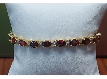 Stunning 32 Ctw Created Ruby & 3 Ctw White Topaz 18k Yellow Gold Plated Fashion Bracelet