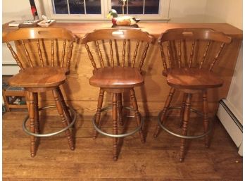 Three Wooden Swivel Bar Height Stools With Metal Ring Footrest