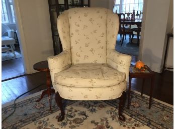 Wing Chair Upholstered In Nice Tan And Muted Floral Fabric