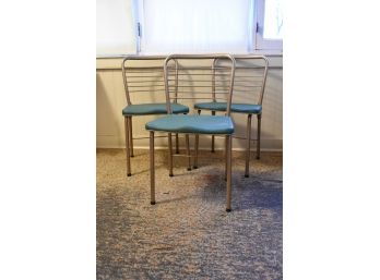 Four Cosco FashionFold Chairs
