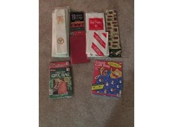 Lot Of Assorted Holiday Gift Bags & Wrapping Tissue