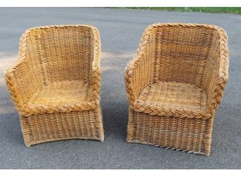 A Pair Of Matching Rattan Wicker Barrel Chairs