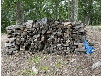 2 Stacked Piles Of Seasoned Firewood