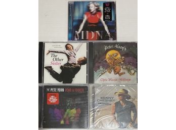 BRAND NEW CDS -LOT #1 - INCLUDES 5 NEW CDS - MADONNA, KENNY CHESNEY