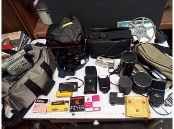 Canon, Olympus, Panasonic, Vivitar, Rollei, Cameras, Palmcorder, Filters, Lenses, Cases  UNTAB