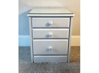 Maco Woods Production, Three Drawer Nightstand With Glass Top