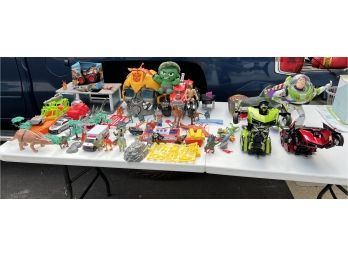 A Large Lot Of Various Action Figurines, Dinosaurs, Cars And More (L7)