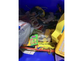 A Tub Of Game Pieces And Gadets Including Snakes And Play Doh Grab Bag