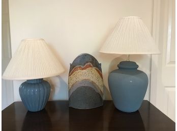 Two Blue Lamps And A Vase