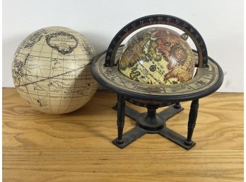 TWO VINTAGE TERRESTRIAL GLOBES, ONE ON METAL STAND AND ONE FREESTANDING. MID TO LATE 20TH CENTURY