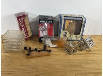 LOT OF VINTAGE PUZZLE AND NOVELTY WOOD AND METAL TOYS