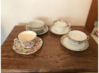 Four Tea Cups And Saucers