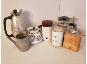 Working Vintage And Modern Coffee Grinders And Pots