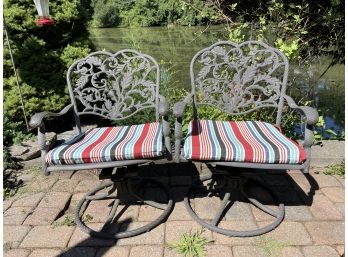 Pair Of Cast Aluminum, Coated Swivel Patio Chairs.