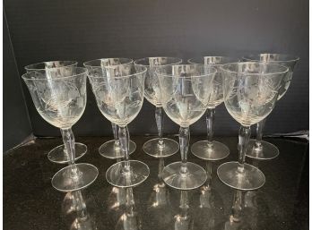 Set Of Nine Engraved Crystal Wine's Stem Glasses.