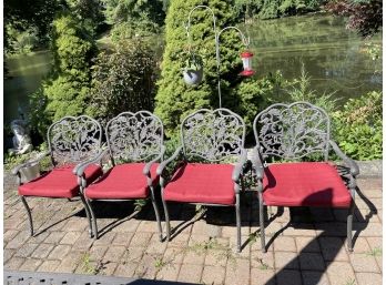 Four Cast Aluminum, Coated Patio Arm Chairs.