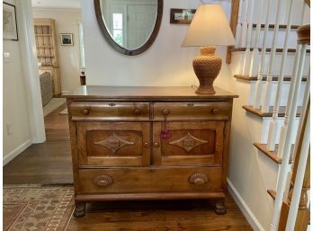 Early 1900s Cabinet With Carved Drawer Pulls