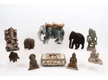 Collection Of Indonesian Figurines And Elephants
