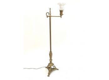 An Tall Antique Bronze Standing Lamp With Milk Glass Shade