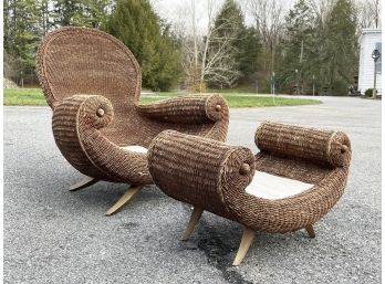 An Oversized Woven Fiber Rolled Arm Chair And Ottoman From Ballard Designs