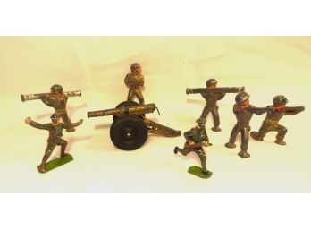 7 Metal Toy Soldiers With Cannon