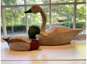 A Wooden Duck And A Wooden Swan.